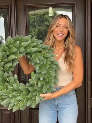 Pre-lit artificial Christmas wreath