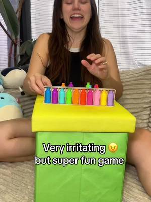 Color-matching miniature bottle game with a ten-slot rack