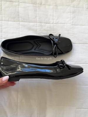 Black patent-look square-toe ballet flats with bow detail