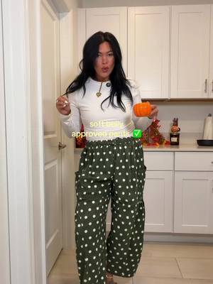 Wide-leg polka-dot corduroy pants with an elastic drawstring waist and oversized pockets