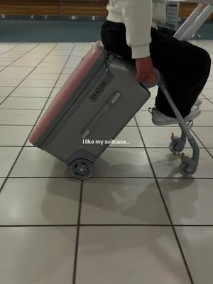Rideable kids suitcase with seat