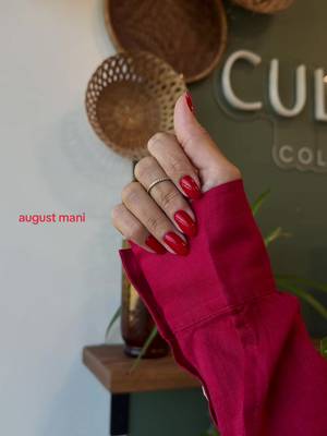 Red manicured nails nail polishgel